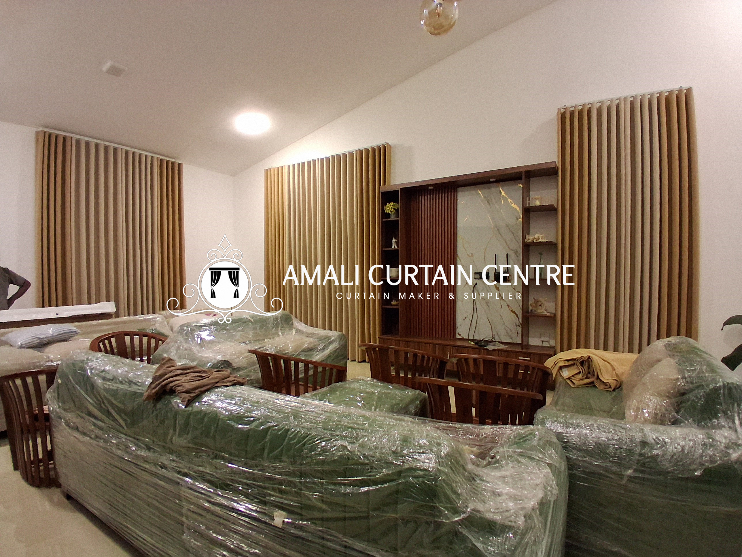 Blackout lining curtains in a dining area by Amali Curtain Center